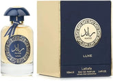Ra'ed Luxe perfume bottle with navy blue cap and gold accents by Lattafa